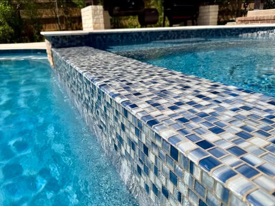 Custom mosaic tile raised wall detail